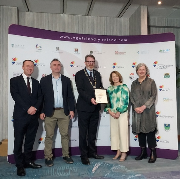 Members of staff and the design team on An Cliathan with their shortlist cert at the Age Friendly Awards 2024