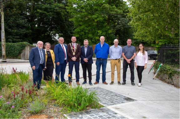 A picture of a group of people at The Crescent/Sea Road Rain Garden