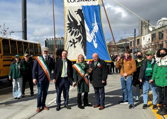 Officials in Seattle with Connacht flag behind them