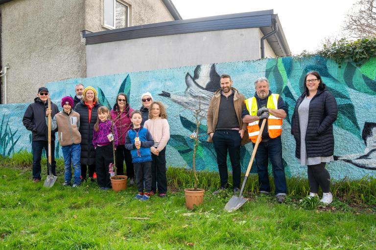 Staff and Residents in Wellpark Grove at new mural