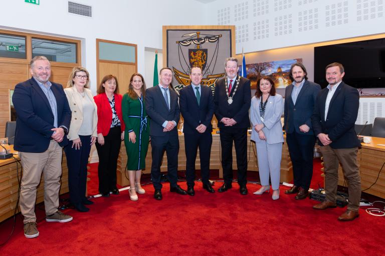 Minister of State John Cummins with GCC staff in City Hall
