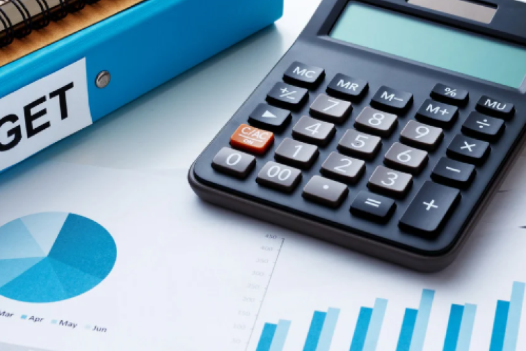 Stock photo of calculator and graphs