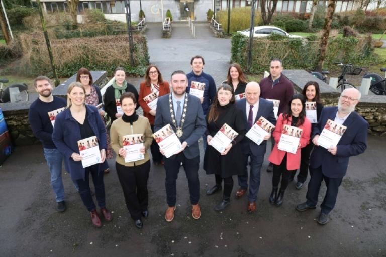 Group with Mayor at Parking Information Pack Launch outside City Hall