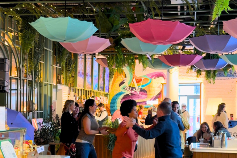 People dancing (salsa) at cafe