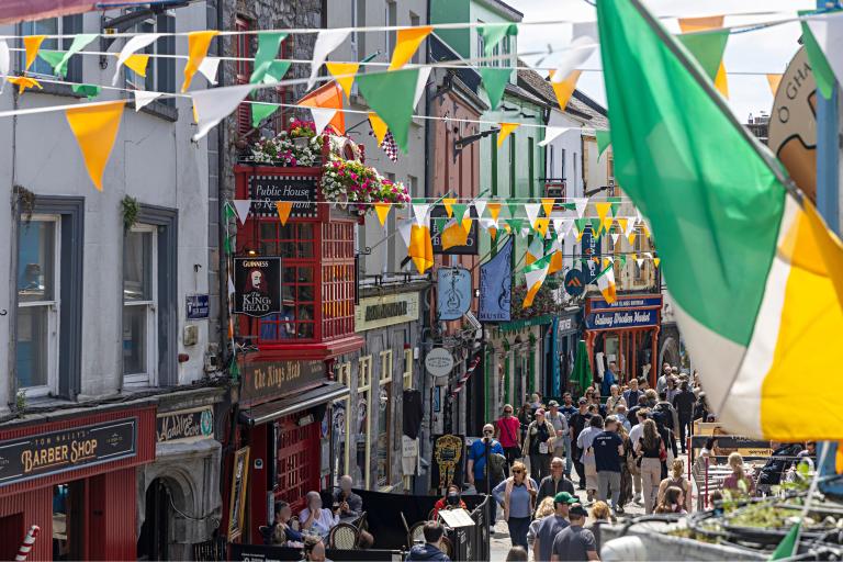 Busy street with Irish flags