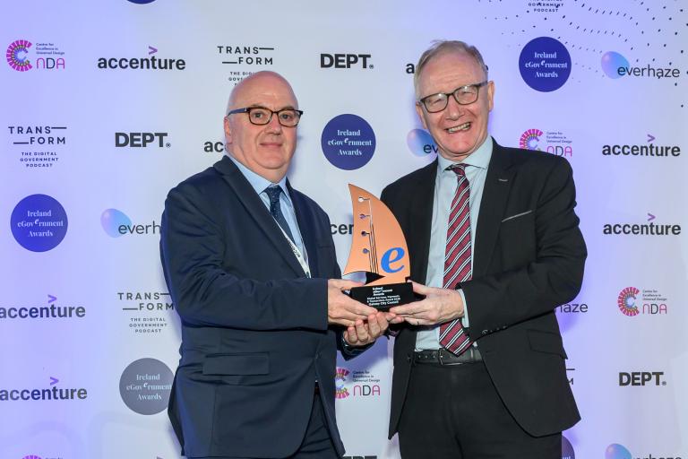 patrick greene accepting an award