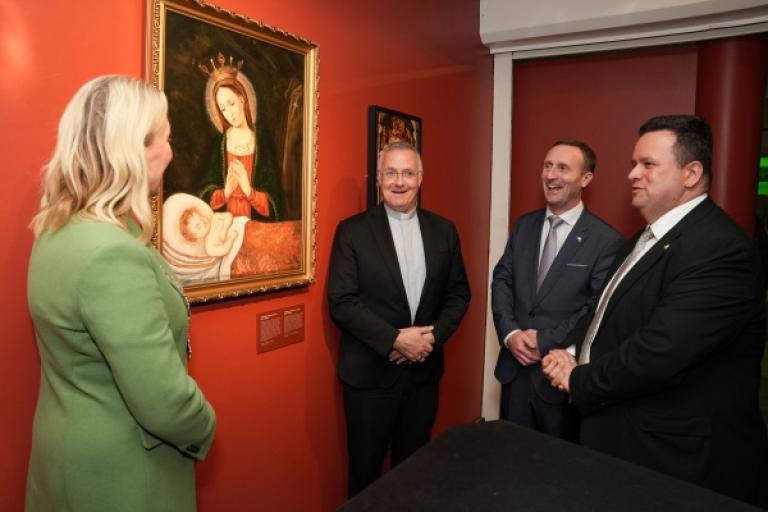 Deputy Mayor of the City of Galway, Cllr. Josie Forde; Bishop of Galway and Clonfert Michael Duignan; Galway City Council Chief Executive Leonard Cleary; and the Hungarian Ambassador, Dr. Gergely Bánhegyi beside the painting 'Irish Madonna' at the launch event. 