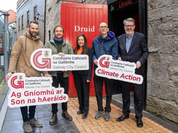 Staff and Deputy Mayor of GCC with Galway Volunteer and Galway City Partnership reps outside Mick Lally Theatre
