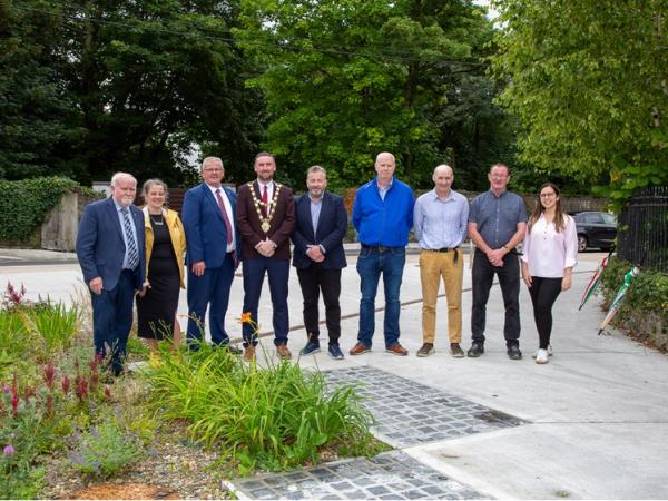 A picture of a group of people at The Crescent/Sea Road Rain Garden