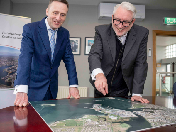 CE Leonard Cleary and Chairperson of Galway Port Maurice O'Gorman looking at an image of the proposed development