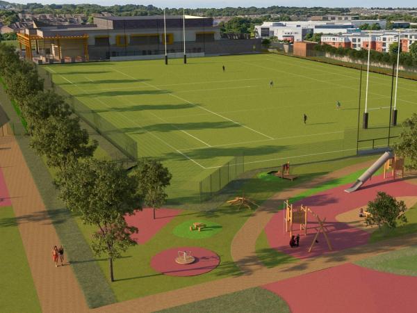 rendering of park in the future. Modern looking rugby pitch and park.
